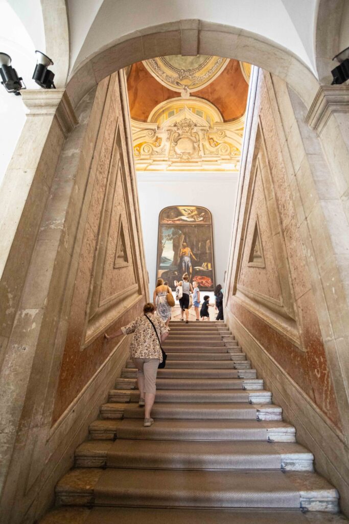 Climbing up the stairs at the Monastery