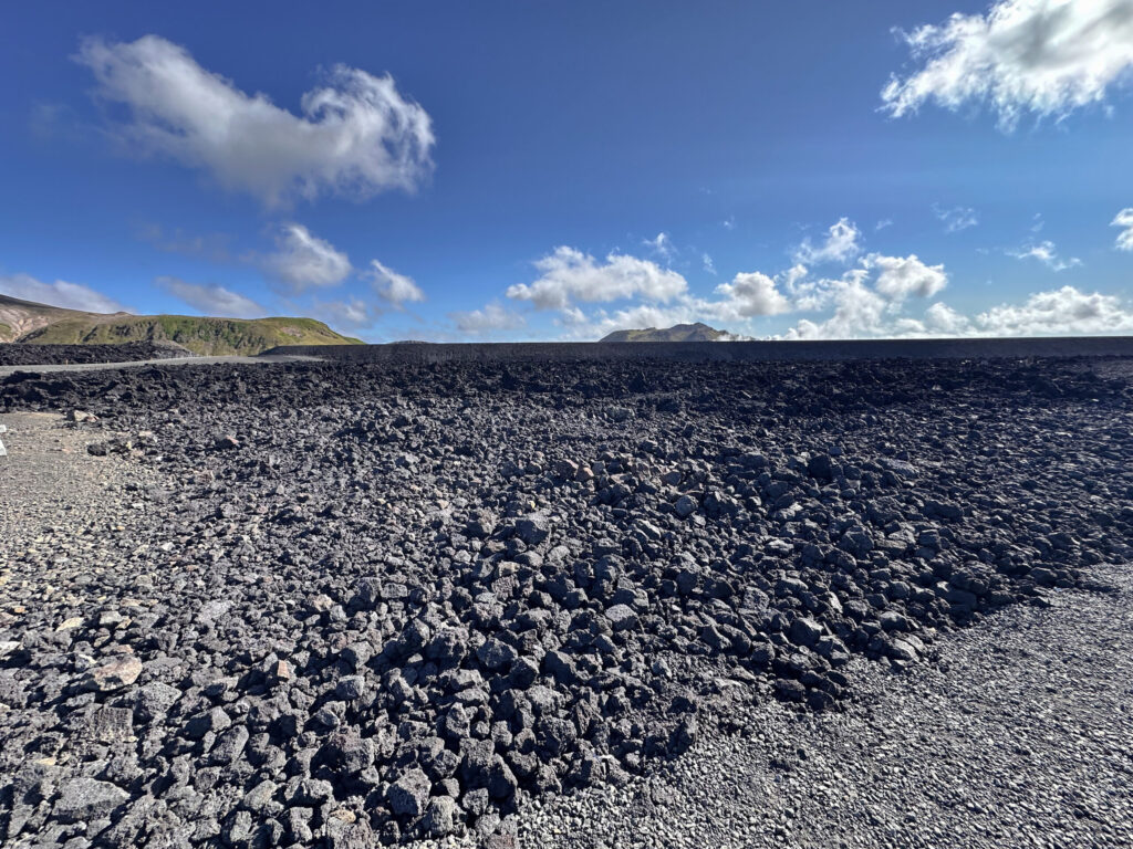 The cooling lava flow.