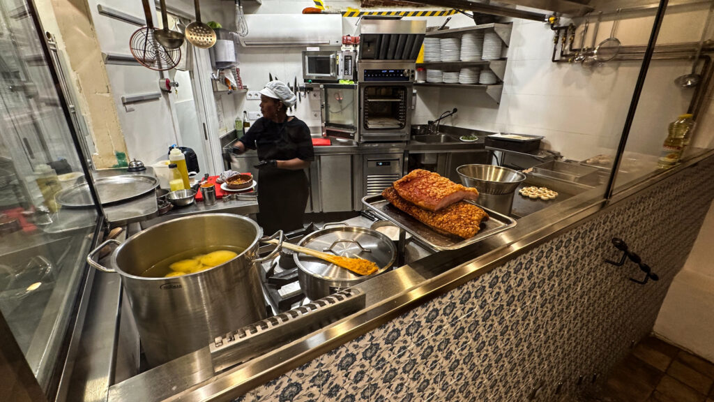 The kitchen at Mesón La Revolcona
